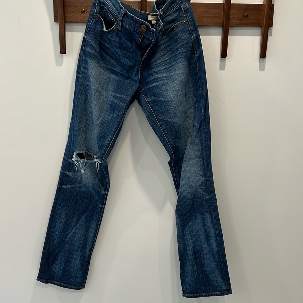 Jcrew Factory jeans. Distressing on right leg. Size 25. Straight leg
